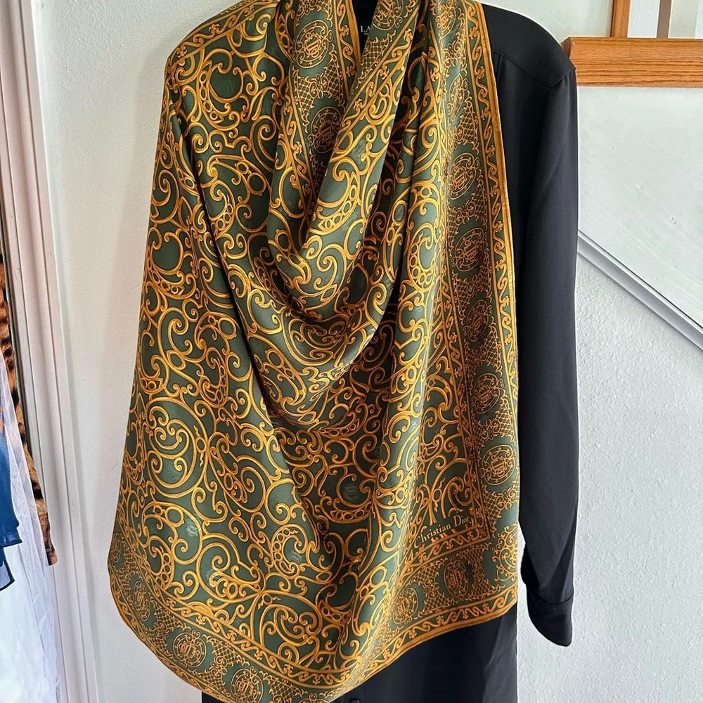Vintage Dior silk scarf with hidden logo 35x35”rolled hem. Tag on side.